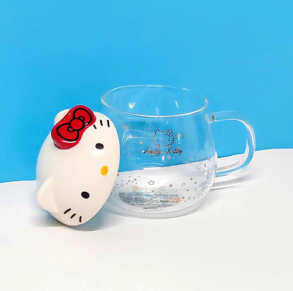 https://hellokittycamp.com/cdn/shop/products/hello-kitty-pyrex-glass-mug-cup-3d-kitty-head-shape-410-ml-221677_1024x1024.jpg?v=1695967701